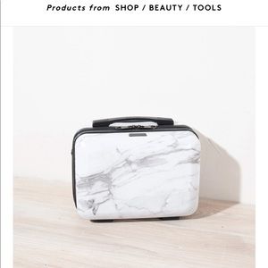 Calpak marble vanity travel case, 3 zipper inside compartments, removeable strap